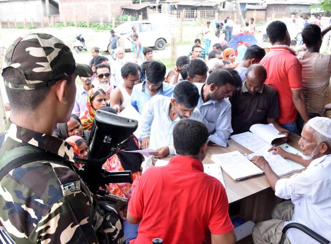 People queue up to check their names in final NRC list at Bhojkhowa in Tezpur on Saturday. Photo: UB Photos