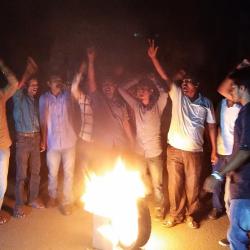 Activists of Krishak Mukti Sangram Samiti (KMSS) protest by burning tyres in front of DC Office against arresting the KMSS leader Akhil Gogoi in Golaghat on Tuesday. Photo by UB Photos.