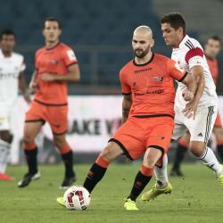 Hans Mulder of Delhi Dynamos FC run against the Guilherme Felipe de Castro of NorthEast United FC during match 16 of the Hero Indian Super League between The Delhi Dynamos FC and NorthEast United FC held at the Jawaharlal Nehru Stadium, Delhi, India on the 29th October 2014.  Photo by: Deepak Malik/ ISL/ SPORTZPICS 