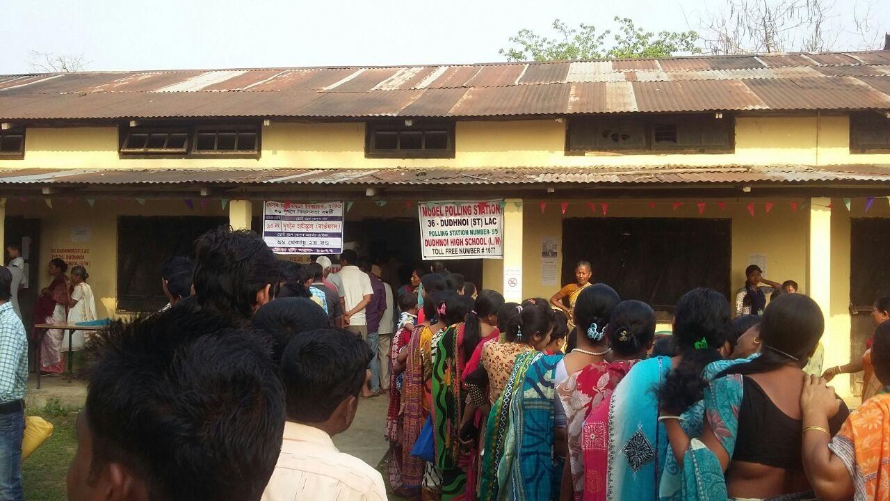 Voters lined up in fromt of a model polling station at Dudhnoi HIgh School