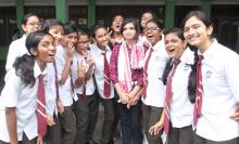 HS Arts 3rd position holder of Mousana Nitingle Chowdhury of St. Mary's School celebrating her victory with friends 