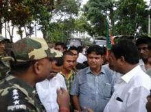 BJP MLAs Ranjit Kr Das and Jadob Deka talking stock of situation at Chetiagaon in Uriamghat on Thursday