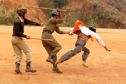 Police batons illegal occupants of government land in Tripura