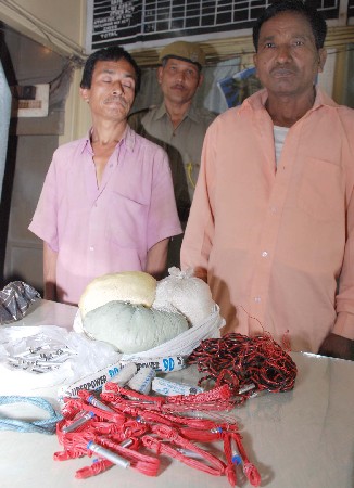 Police pick up 2 with explosive materials