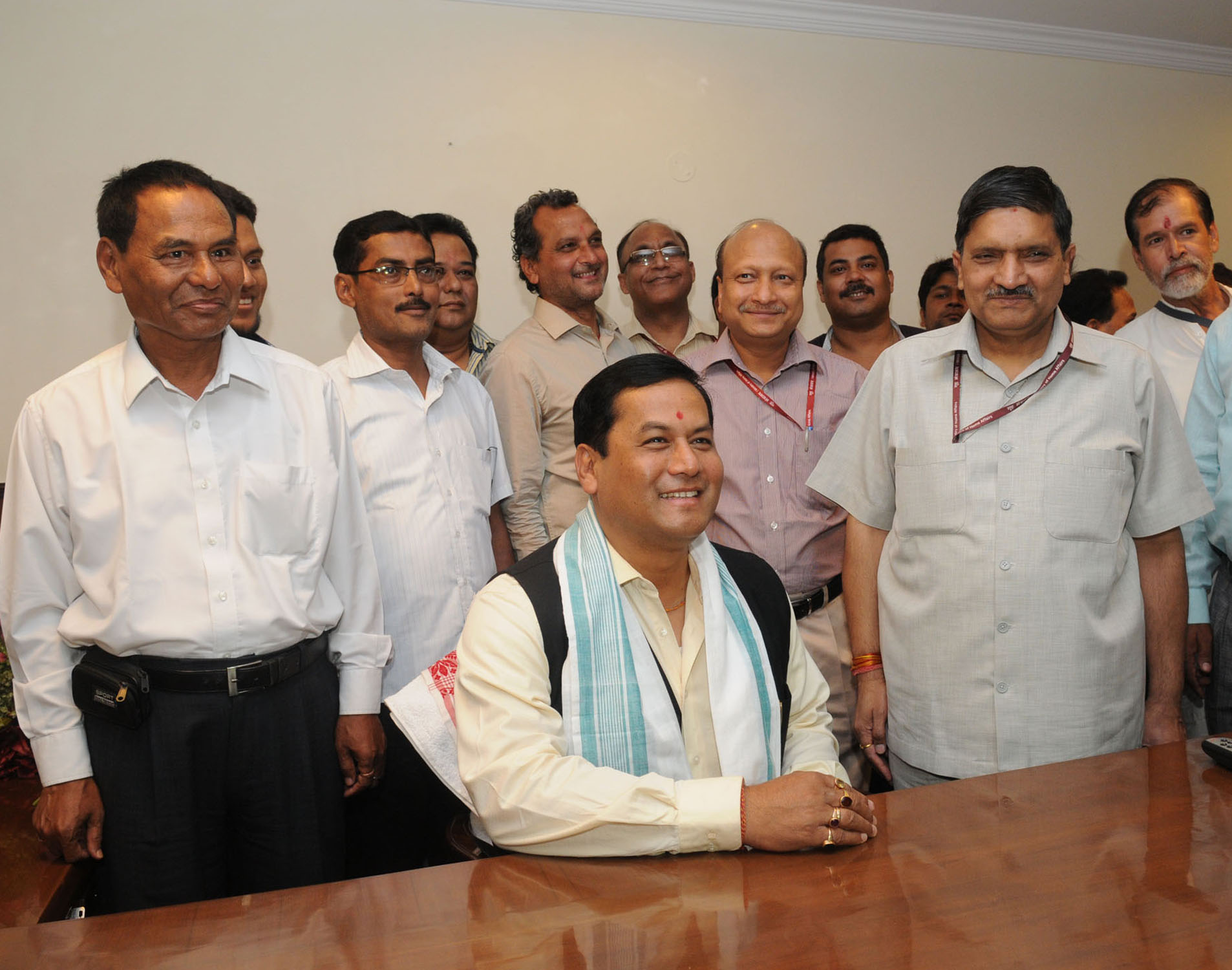 Sonowal assumes charges