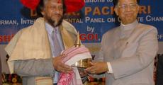 Chief Minister of Assam Tarun Gogoi felicitated Dr. R.K Pachauri,