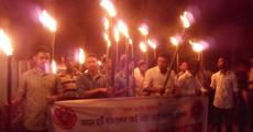 AASU torch rally against land deal