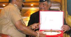 Pradip Ranjan Kar receive award from Guv