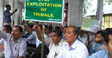 Tribal sangha stages dharna