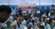 Sit in stir for AIIMS at Raha