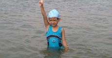 5-year old crosses Ganga