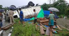 Timber laden truck mishap