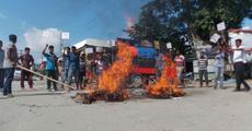 AAMSU burn effigies of Sonwoal, Sarma