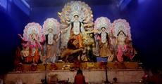 Devotees throng Puja venues