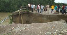 Flood water washed away highway bridge 