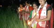 Earthen lamps illuminating Kati Bihu glory