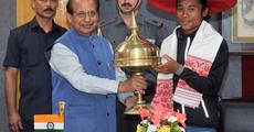 Governor feats athlete Hima Das 