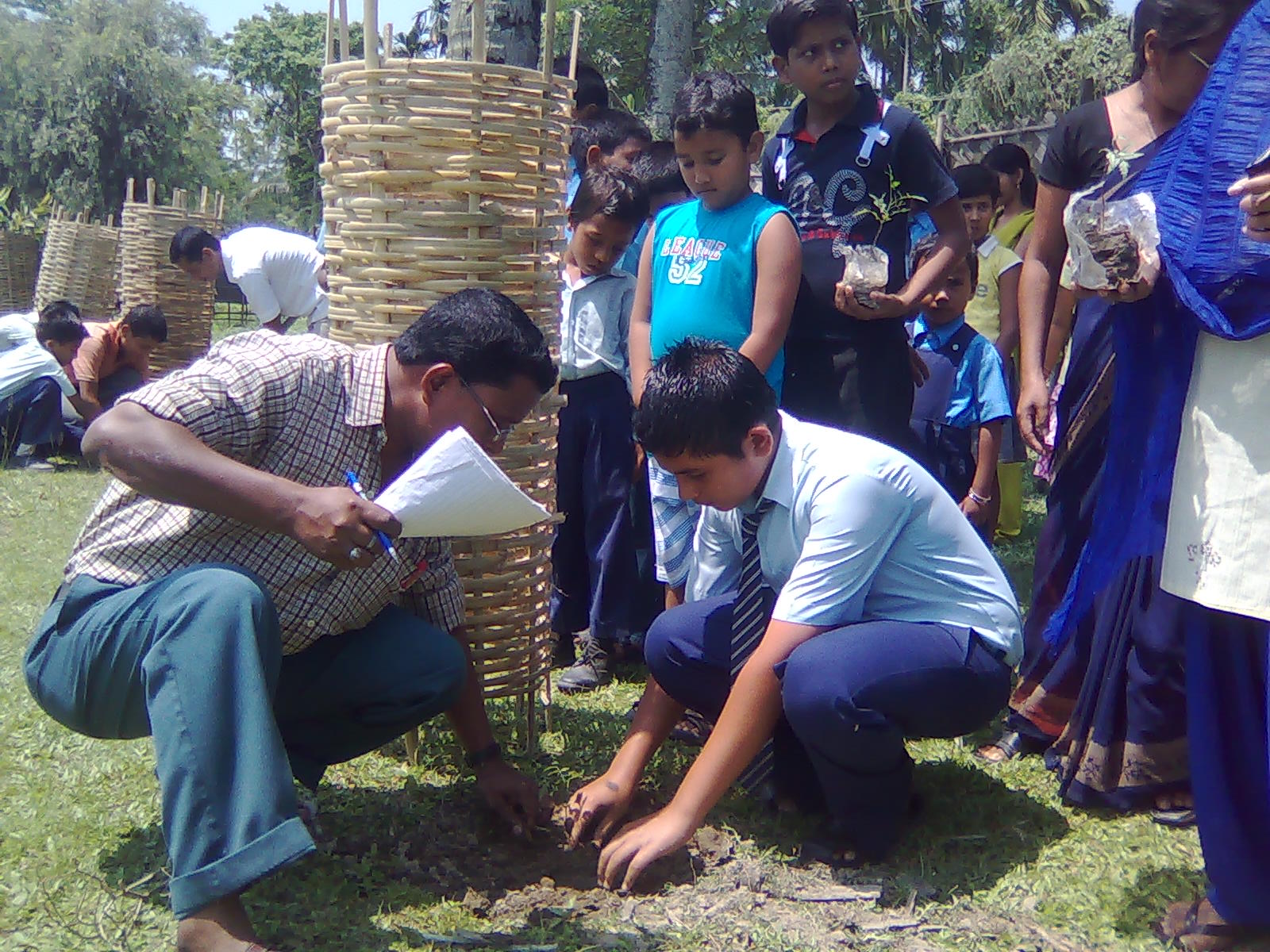 School children plant medicinal plants