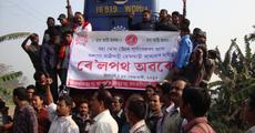 Silghat-Guwahati passenger train blockade by AASU at Raha demanding stoppage