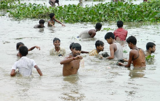Money on fishnet in Guwahati water body
